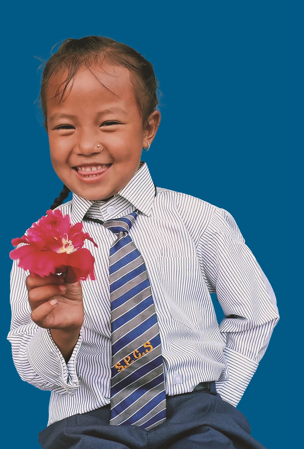 Young girl holding flower